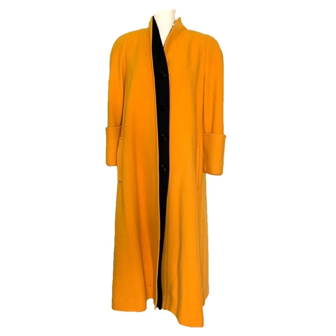 1980s Yellow Wool Coat by Ilie Wacs. Bold and Oversized with Black Collar and Button Accents.